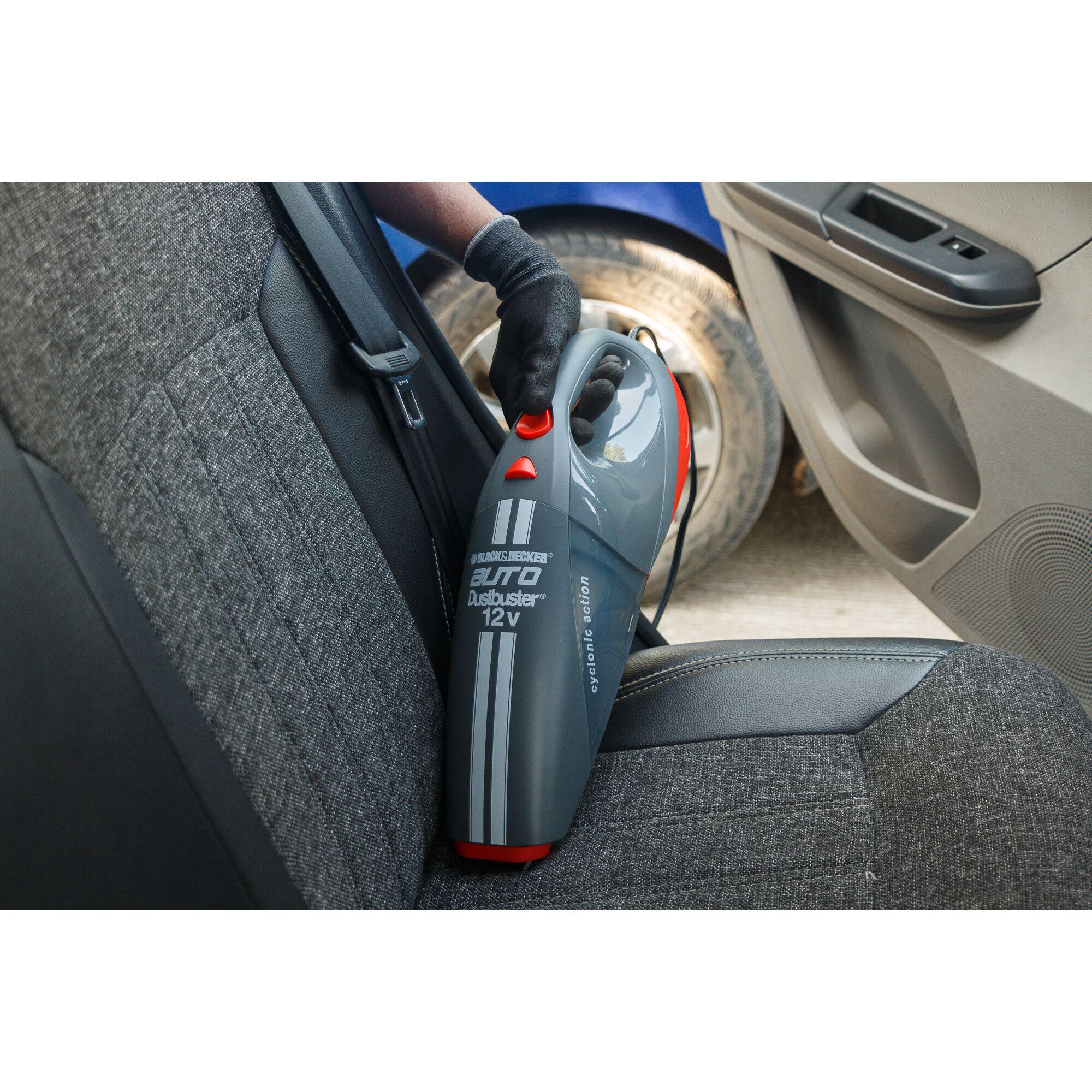 BLACKDECKER ACV1205 handheld vacuum cleaning car seat, grey and red design, close-up angle