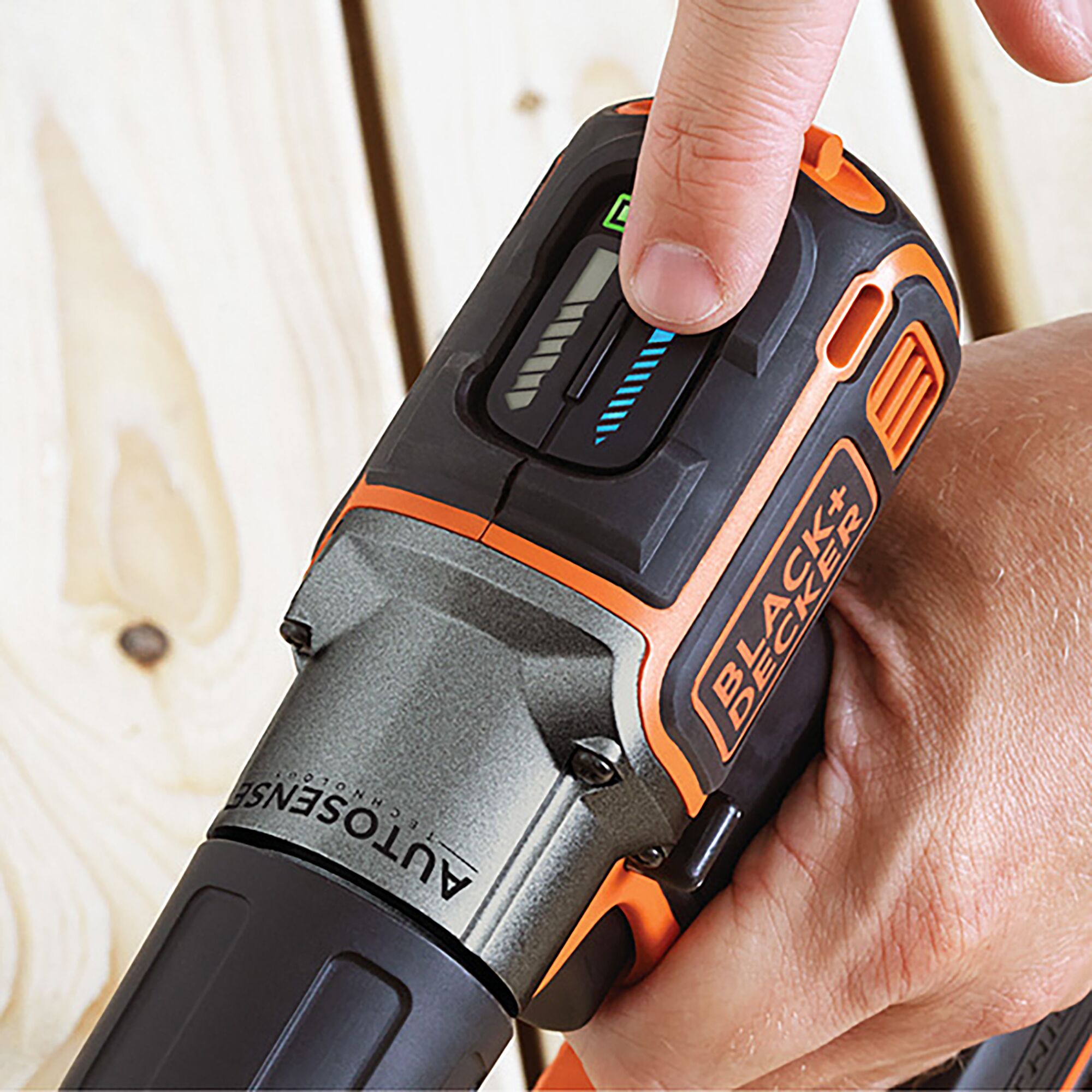 BLACKDECKER AUTO01 power tool with AUTOSENSE controls, close-up showing settings adjustment.