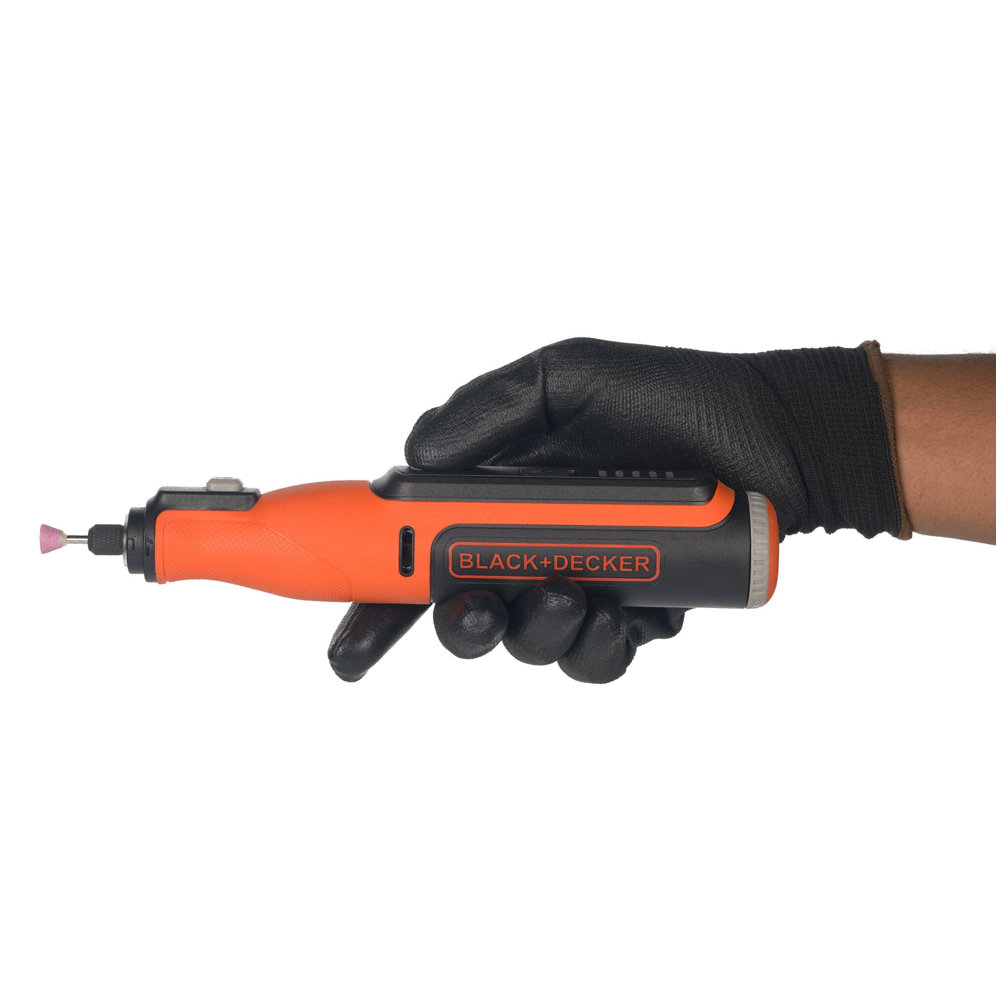 Photo of BLACK+DECKER BCRT8K35 rotary tool with orange and black body, held in a gloved hand, side angle.