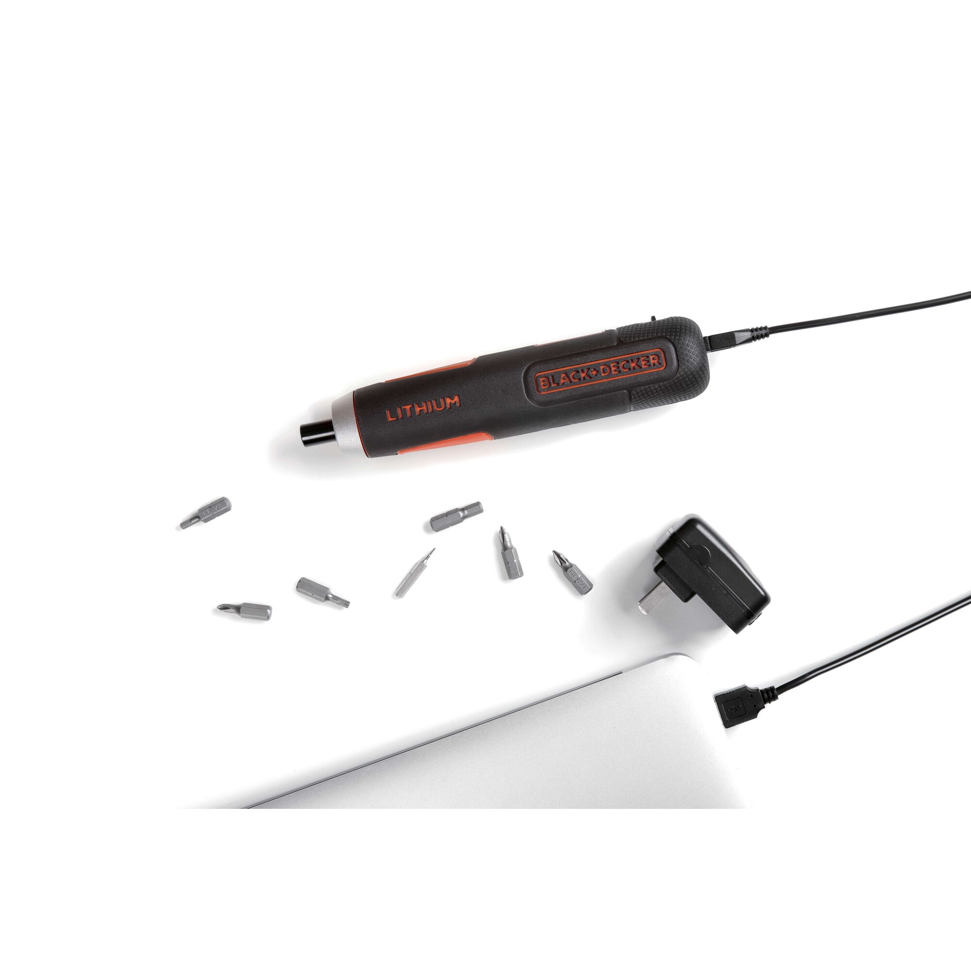 BLACKDECKER BD40K27 cordless screwdriver with charger and interchangeable bits, top angle on white background.