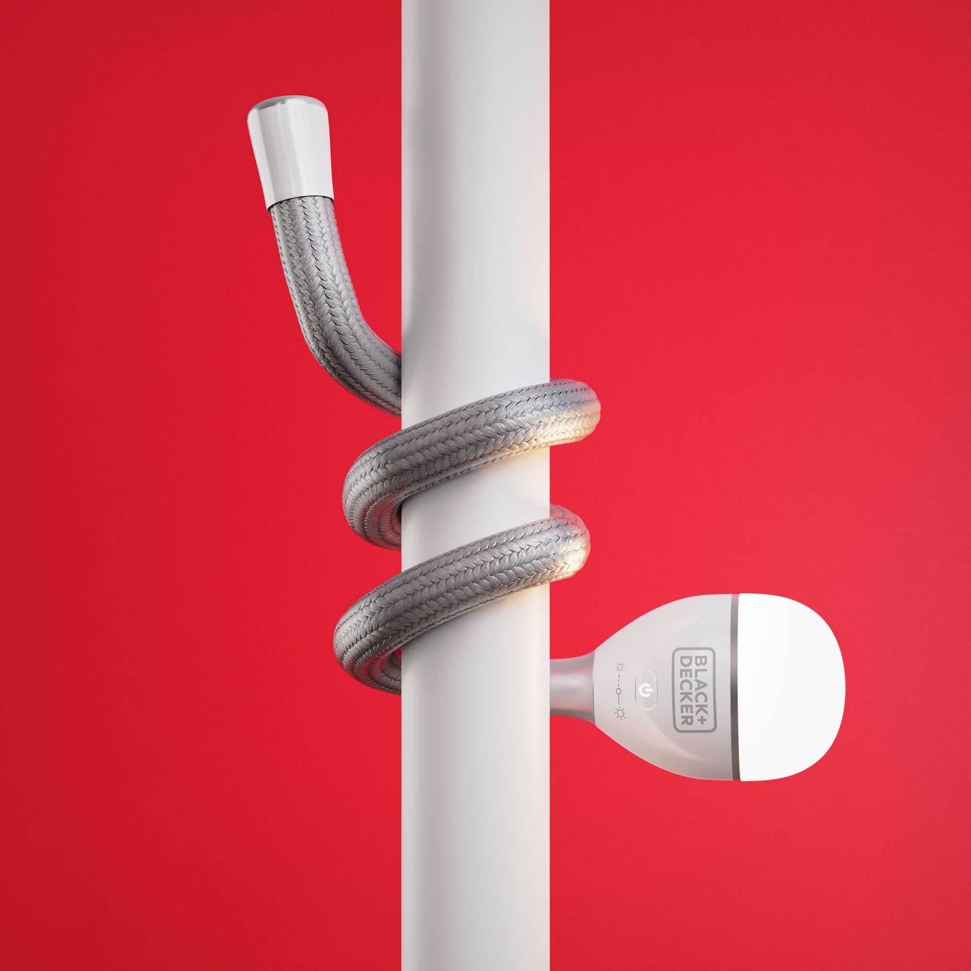 BLACK+DECKER BDCFSL01 flexible LED lamp wrapped around white pole, side angle, red background.