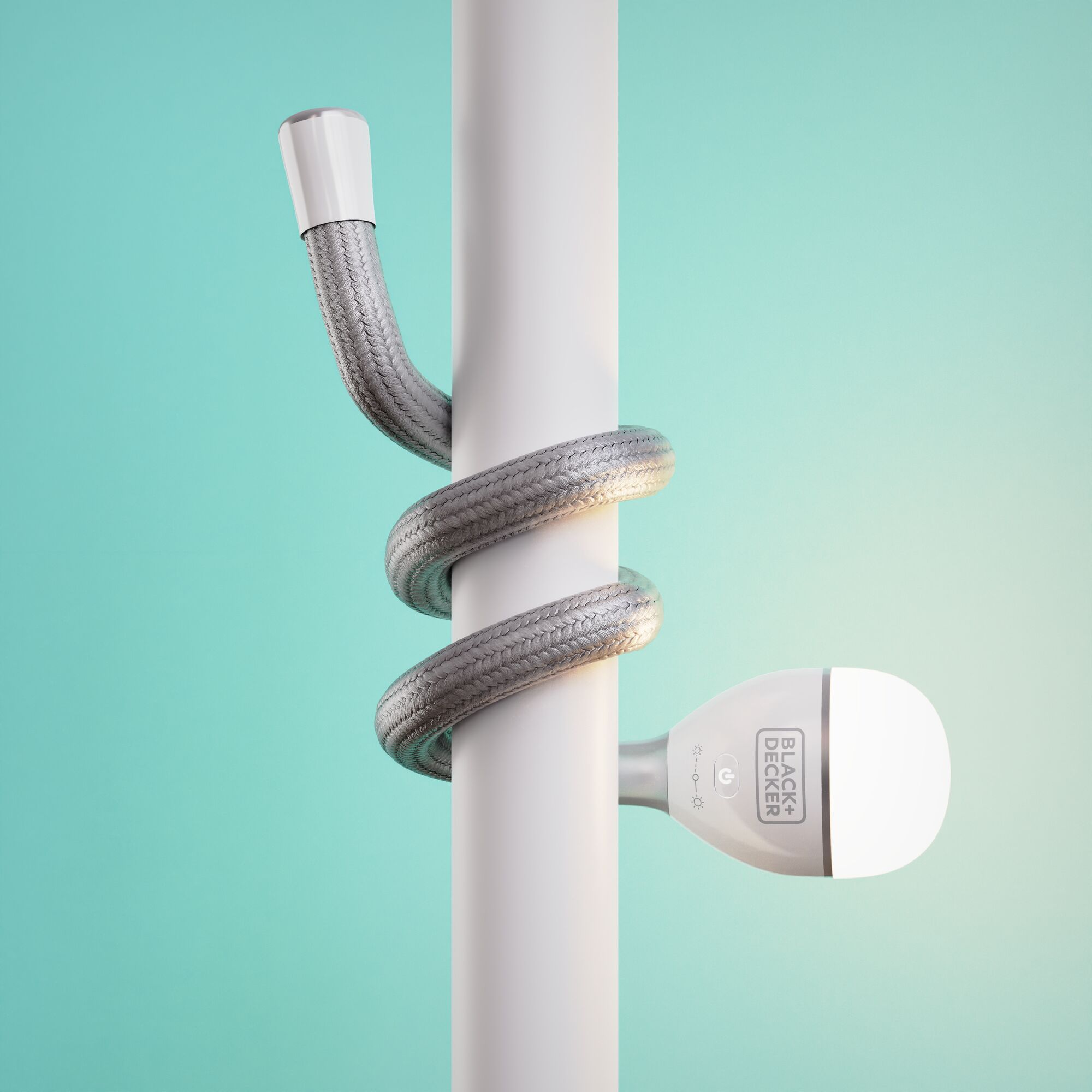 BLACKDECKER BDCFSL01 flexible LED lamp wrapped around a white pole, turquoise background.