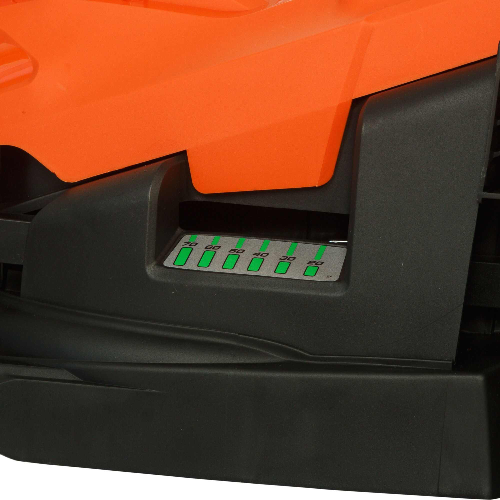BLACKDECKER BEMW461BH lawn mower close-up showing height adjustment scale, orange and black plastic.