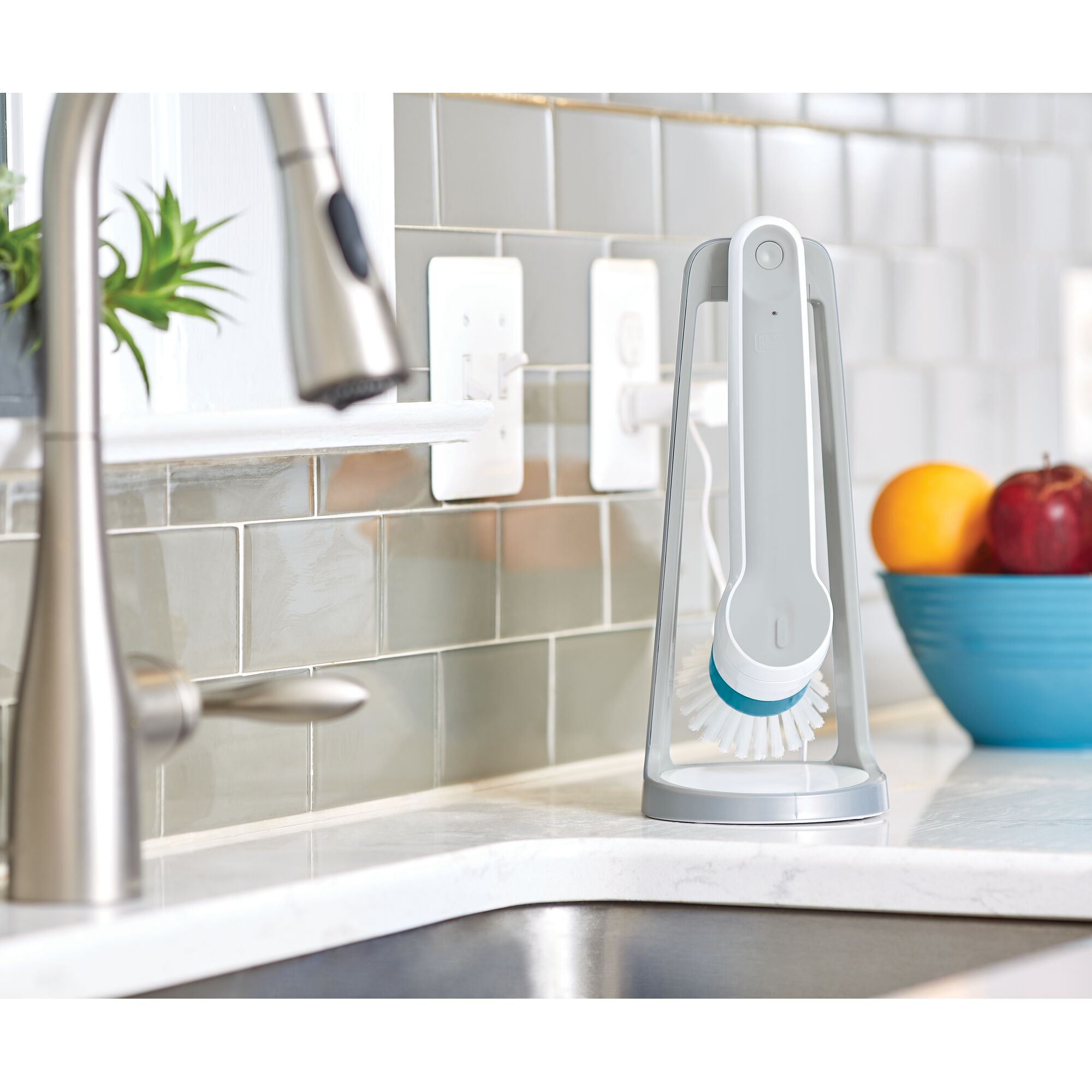 BLACKDECKER BHPC110 handheld brush with docking station, photography of kitchen countertop.