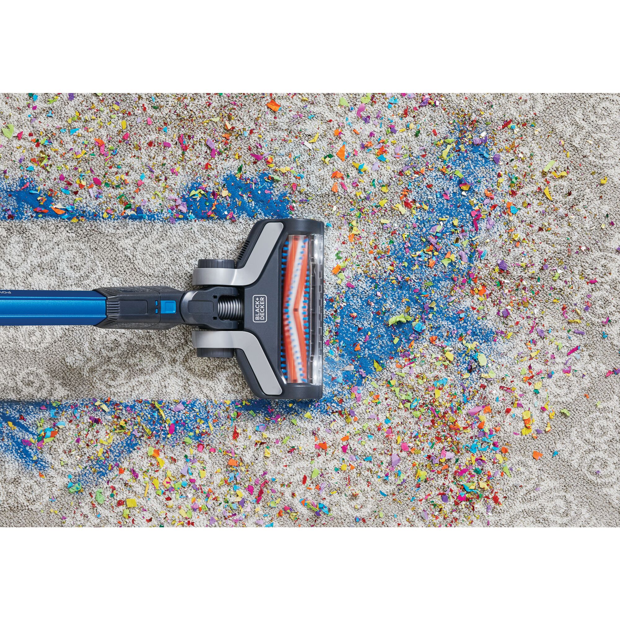 POWER SERIES Extreme Cordless Stick Vacuum Cleaner being used for cleaning mess from carpet.