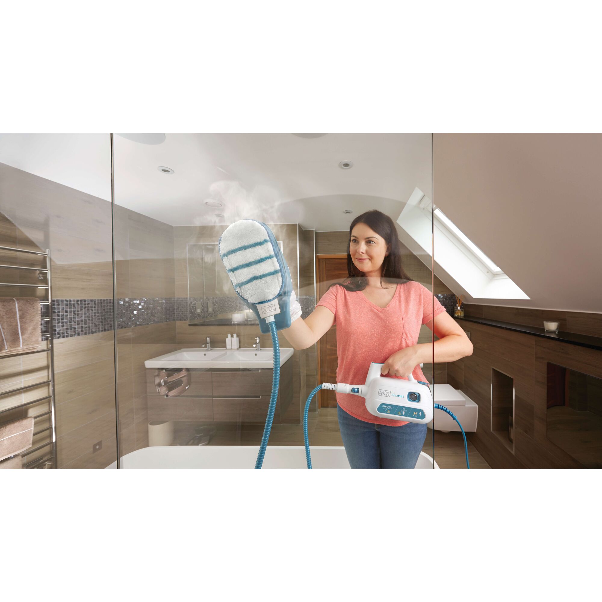 BLACKDECKER FSH10SM steam cleaning glove used on glass shower in bathroom, blue and white design.