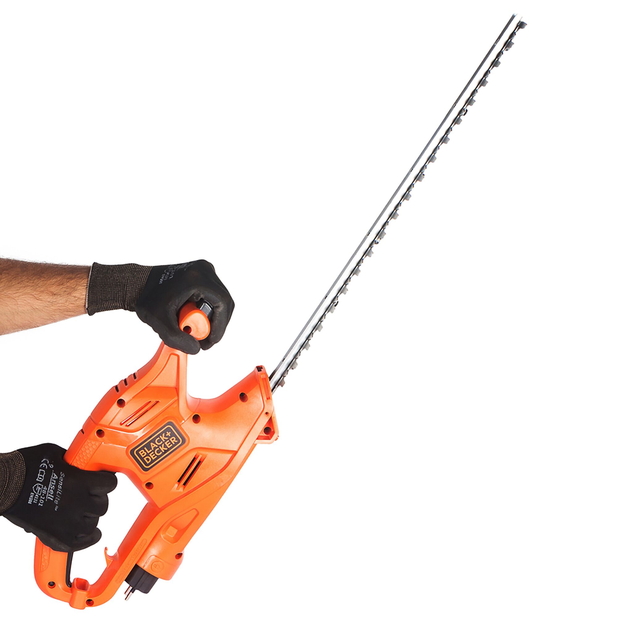BLACKDECKER hedge trimmer GT4245 held in hand, side angle, orange body and long blade.