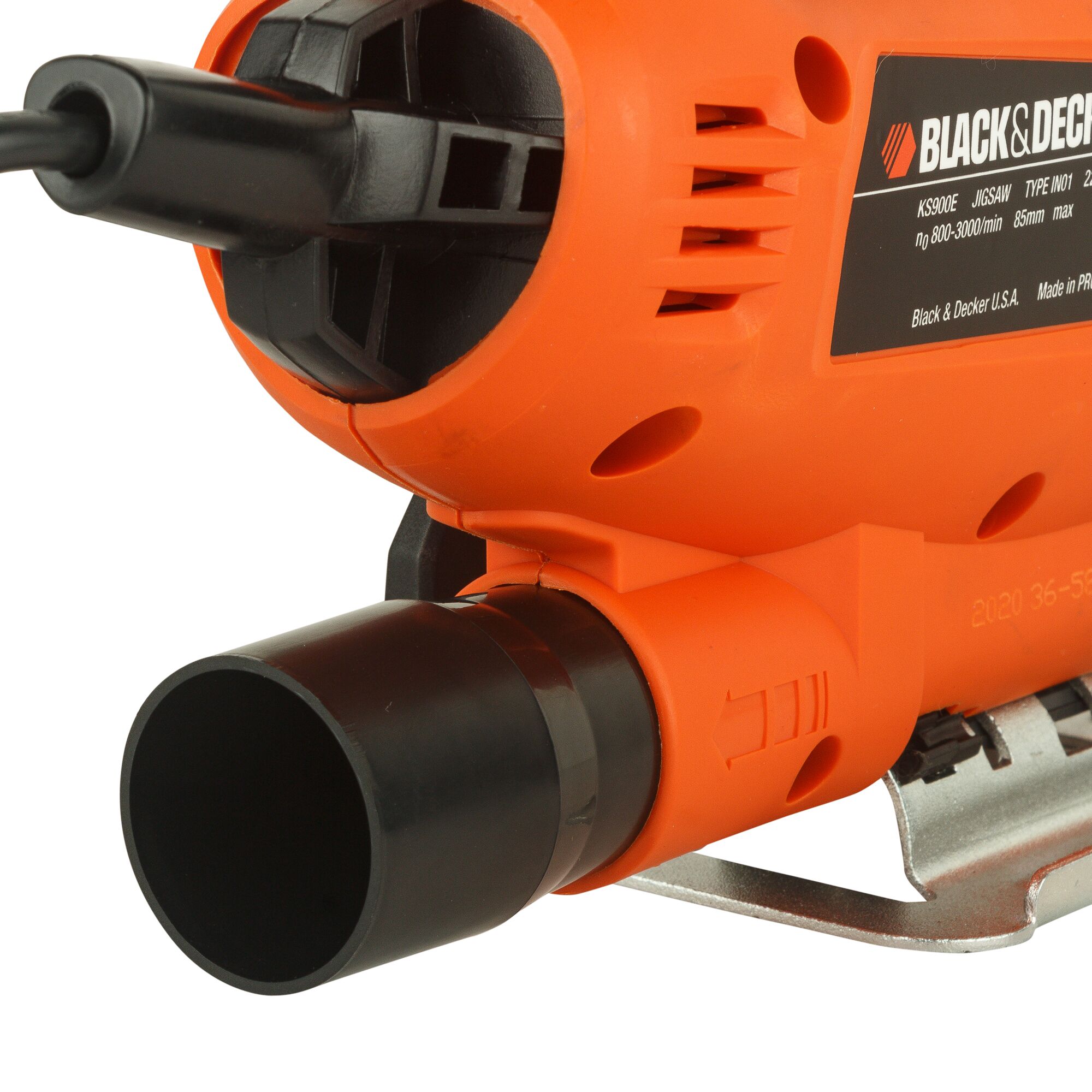 BLACKDECKER KS900EKX photography of orange jigsaw close-up, showing dust extraction port on white background.