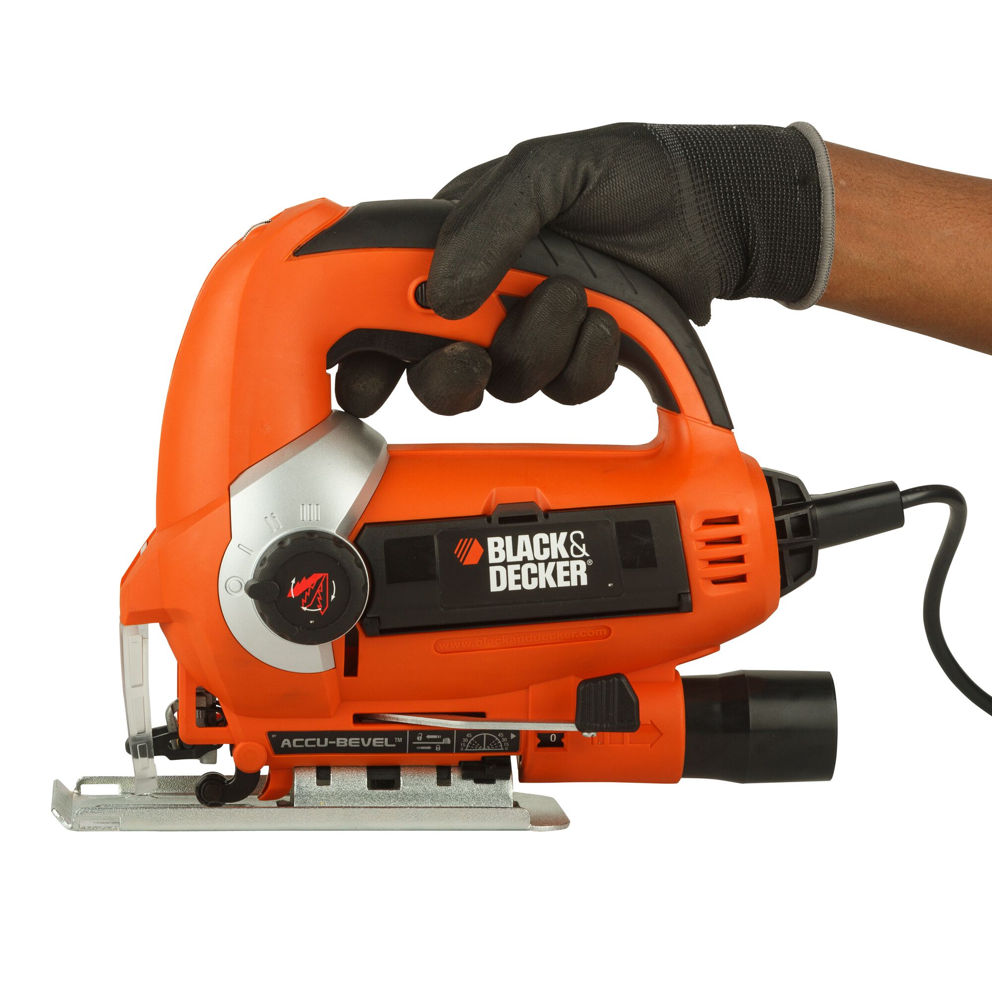 BLACKDECKER KS900EKX jigsaw power tool, orange and black, side angle, held by gloved hand, photography
