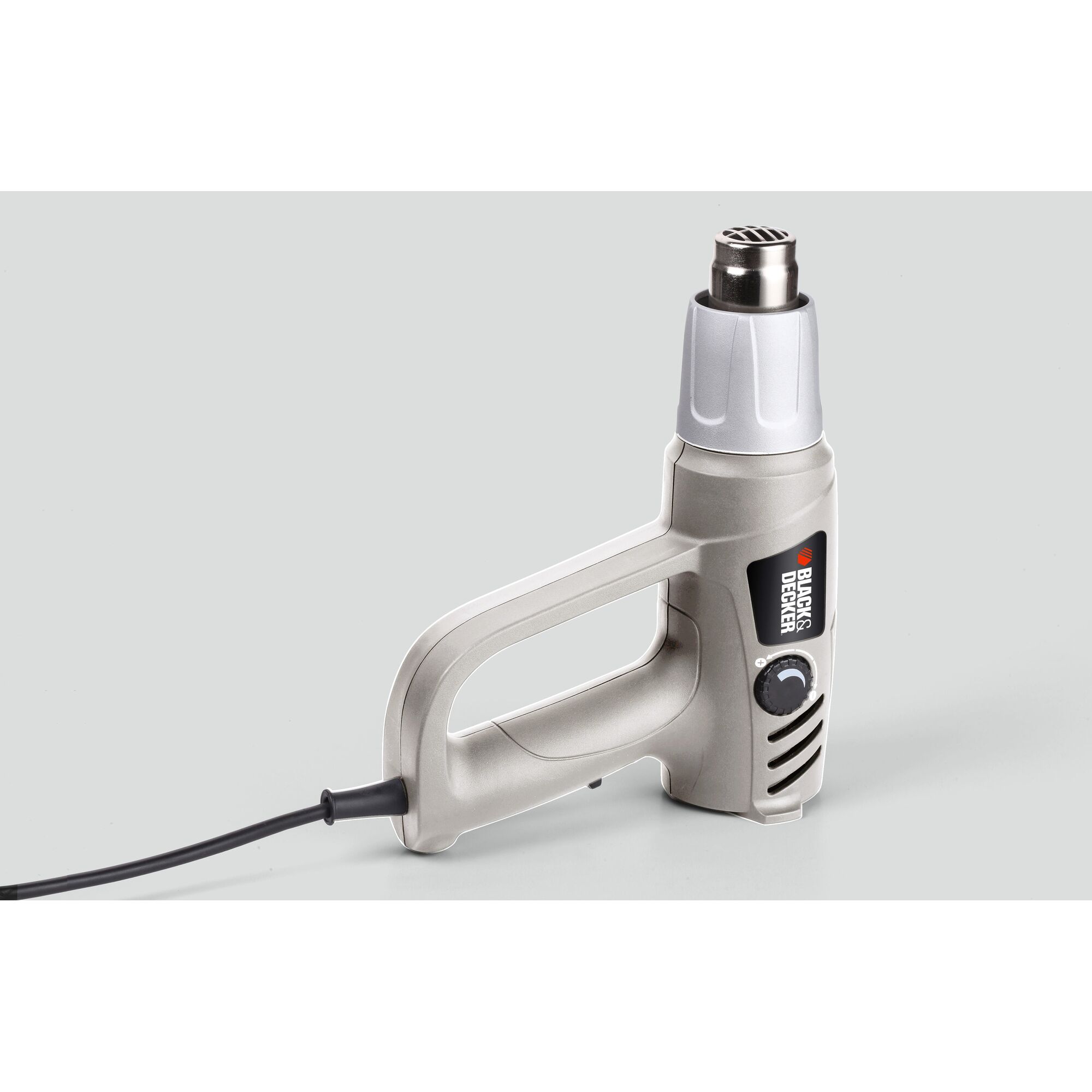 BLACK+DECKER KTX2500 heat gun with silver body, black dial, side angle on white background.