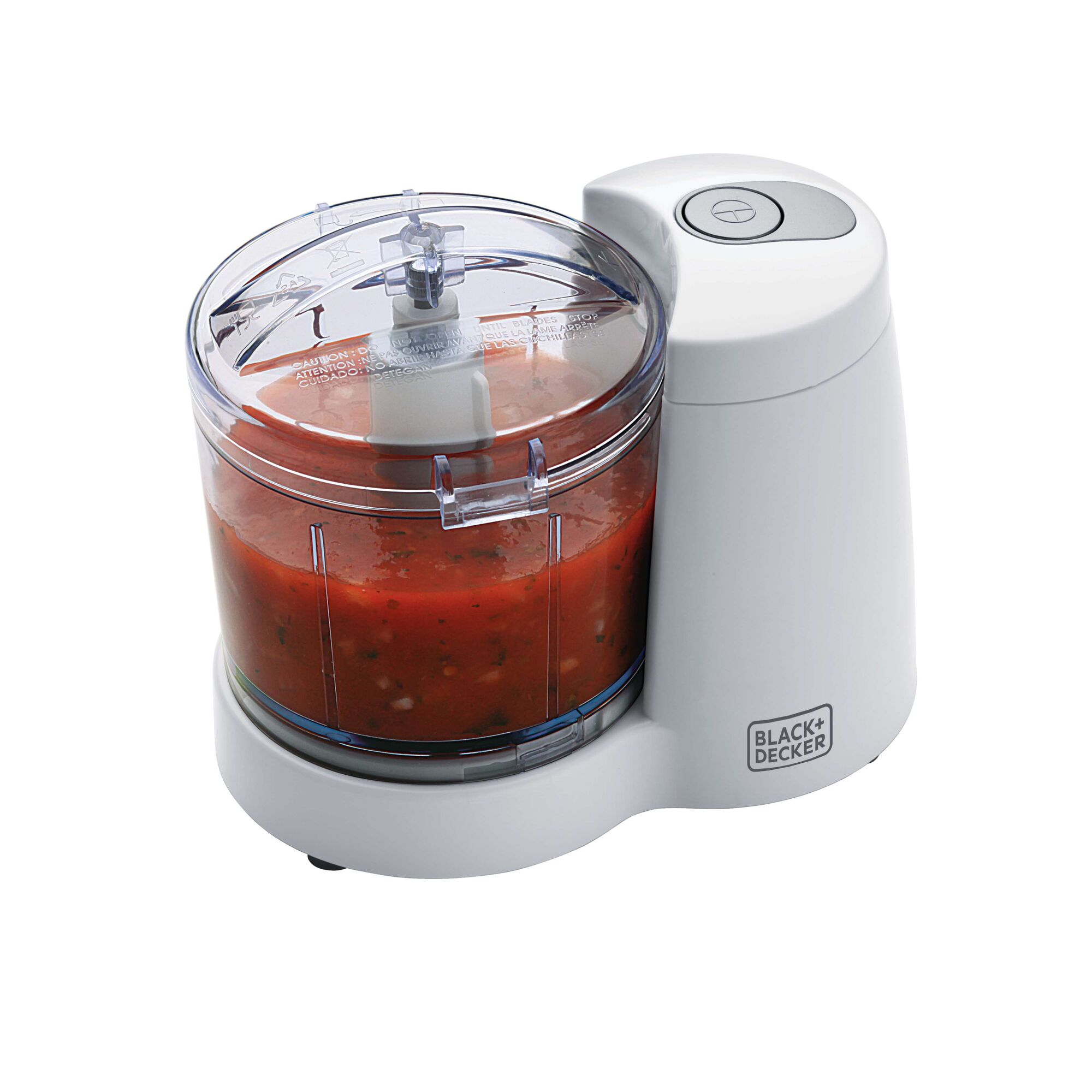 BLACKDECKER SC350 white food chopper with transparent bowl filled with salsa, front angle.