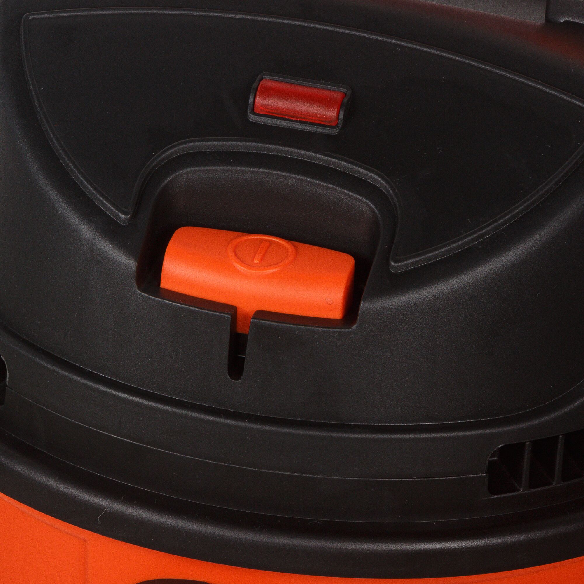 BLACKDECKER WDBD20 vacuum cleaner control panel, orange and black, close-up view.
