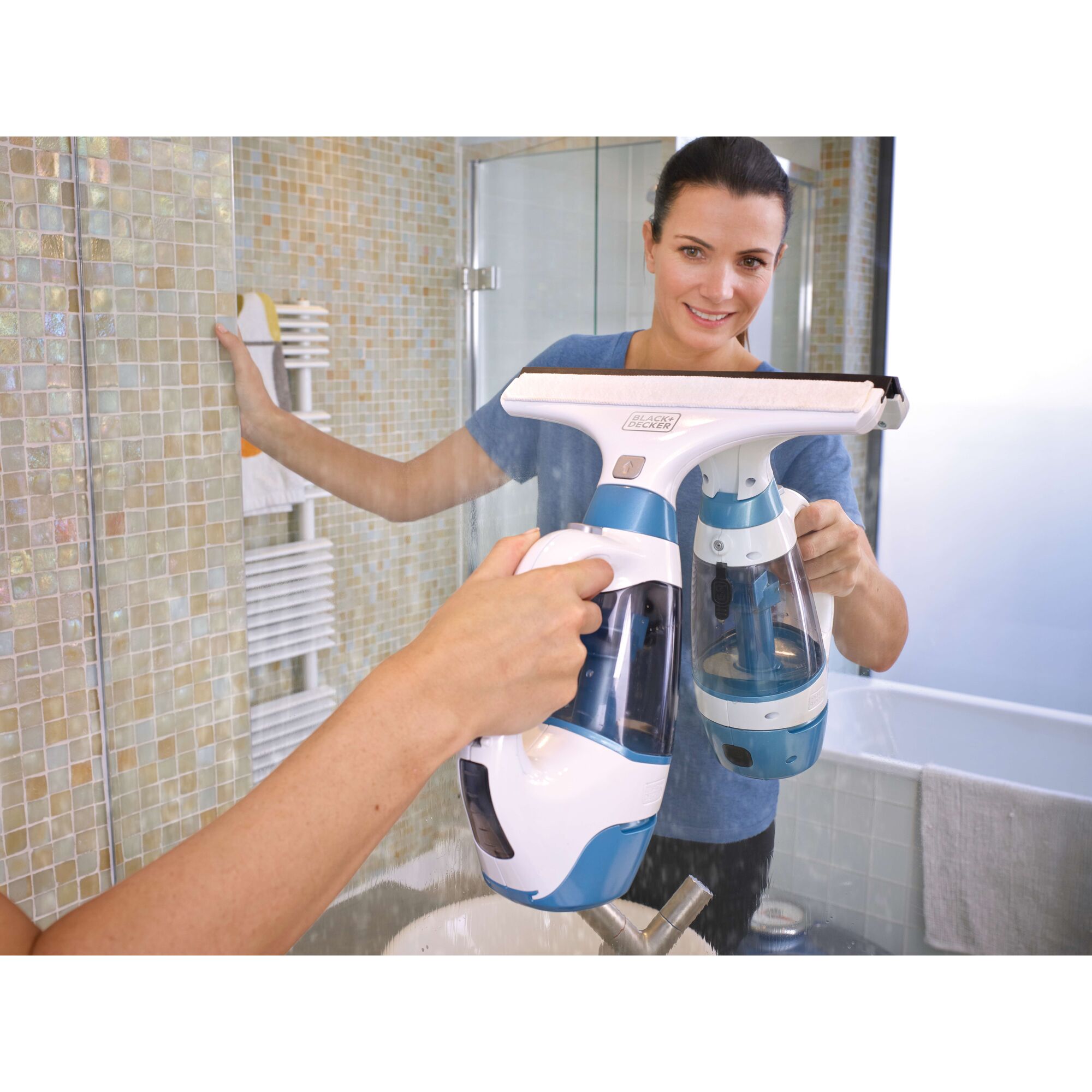 Photo of BLACKDECKER WW100 window vacuum cleaner in use on bathroom mirror.